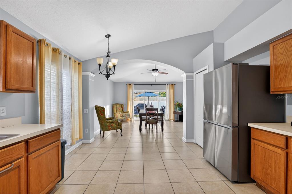11519 Misty Isle Lane Riverview, FL 33579 - Photo 10 of 27 a view of a dining room with furniture window and outside view