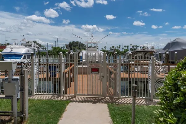 a view of a house with a small yard and plants