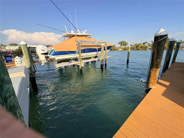a view of swimming pool with outdoor seating