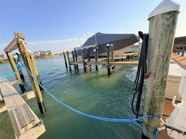 a view of a balcony with chairs