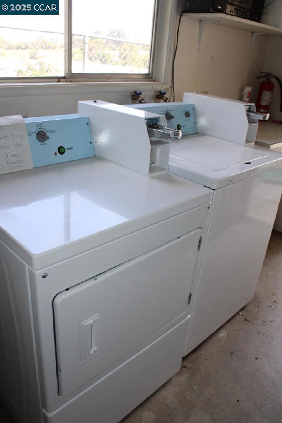 2292 Orleans Drive Pinole, CA 94564 - Photo 15 of 16 a utility room with dryer and washer
