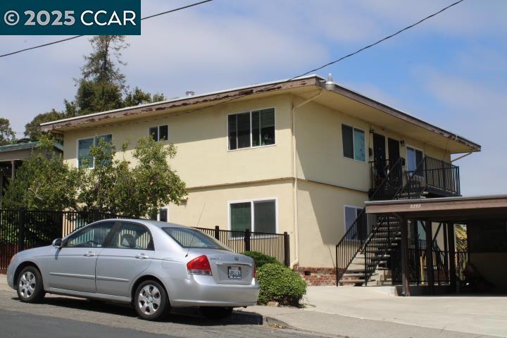 2292 Orleans Drive Pinole, CA 94564 - Photo 16 of 16 a view of a car parked in front of a house