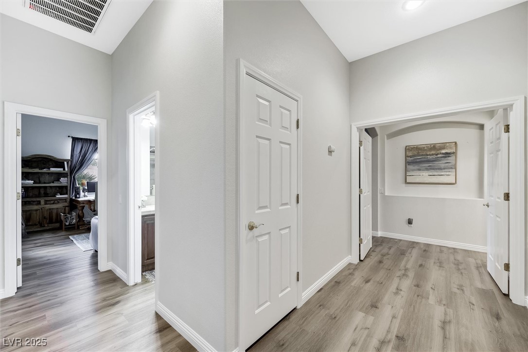 10720 Elm Ridge Avenue Las Vegas, NV 89144 - Photo 23 of 67 Hallway with light wood-style floors