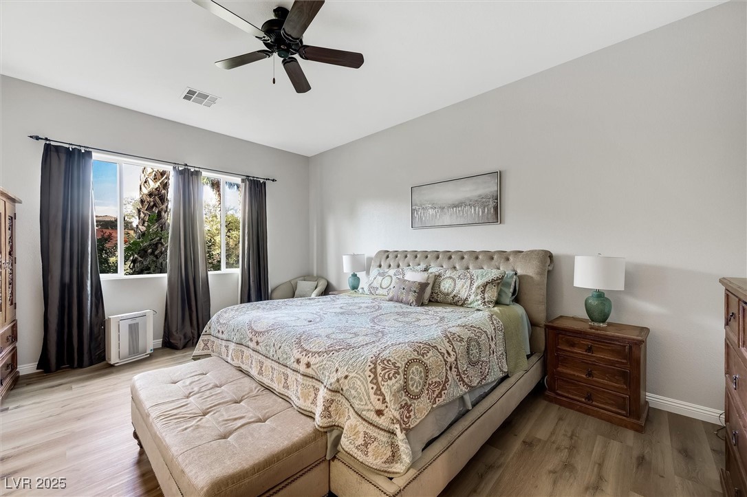 10720 Elm Ridge Avenue Las Vegas, NV 89144 - Photo 32 of 67 Bedroom with wood finished floors and ceiling fan