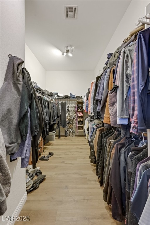 10720 Elm Ridge Avenue Las Vegas, NV 89144 - Photo 38 of 67 Spacious closet with light wood-type flooring