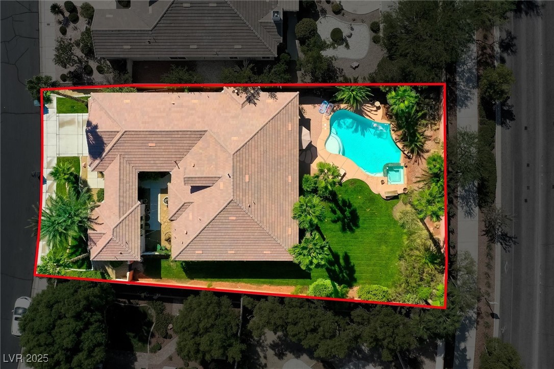 10720 Elm Ridge Avenue Las Vegas, NV 89144 - Photo 57 of 67 Aerial overview of property's location featuring a pool area and property boundaries highlighted