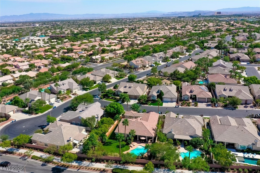 10720 Elm Ridge Avenue Las Vegas, NV 89144 - Photo 60 of 67 Aerial view of residential area with mountains