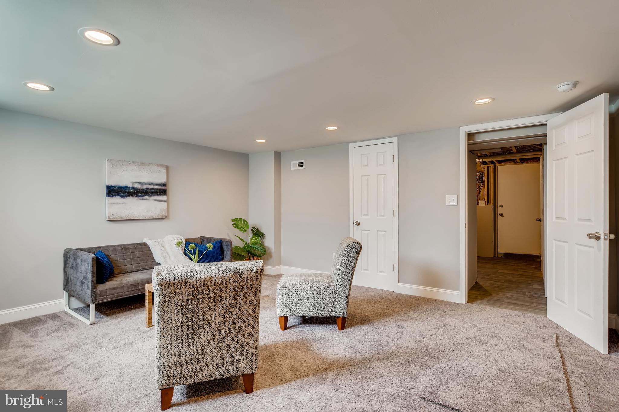 818 Reverdy Road Baltimore, MD 21212 - Photo 23 of 28 Basement Living room/ guest room