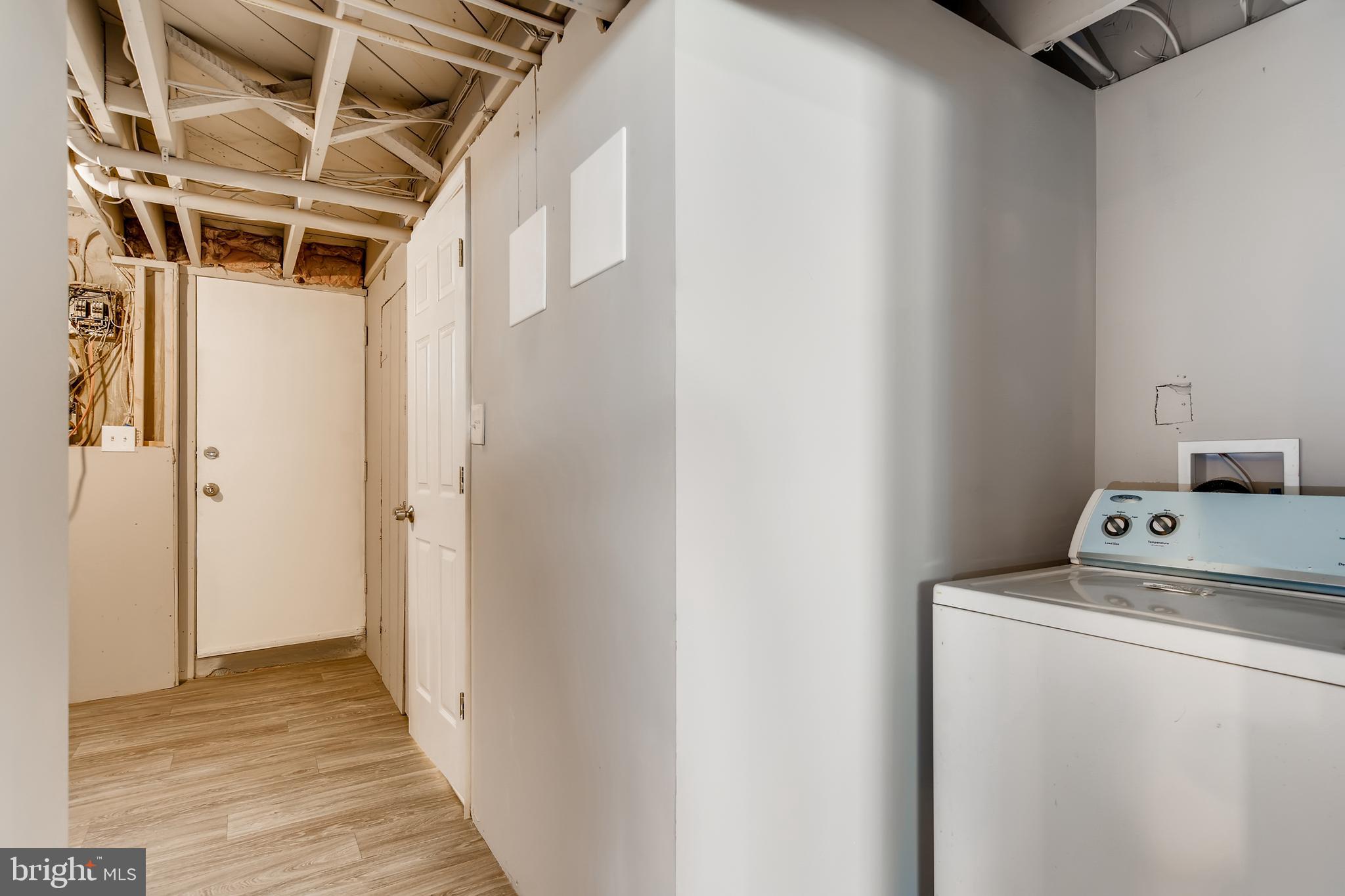 818 Reverdy Road Baltimore, MD 21212 - Photo 25 of 28 Utility Room entrance, basement walkout visible