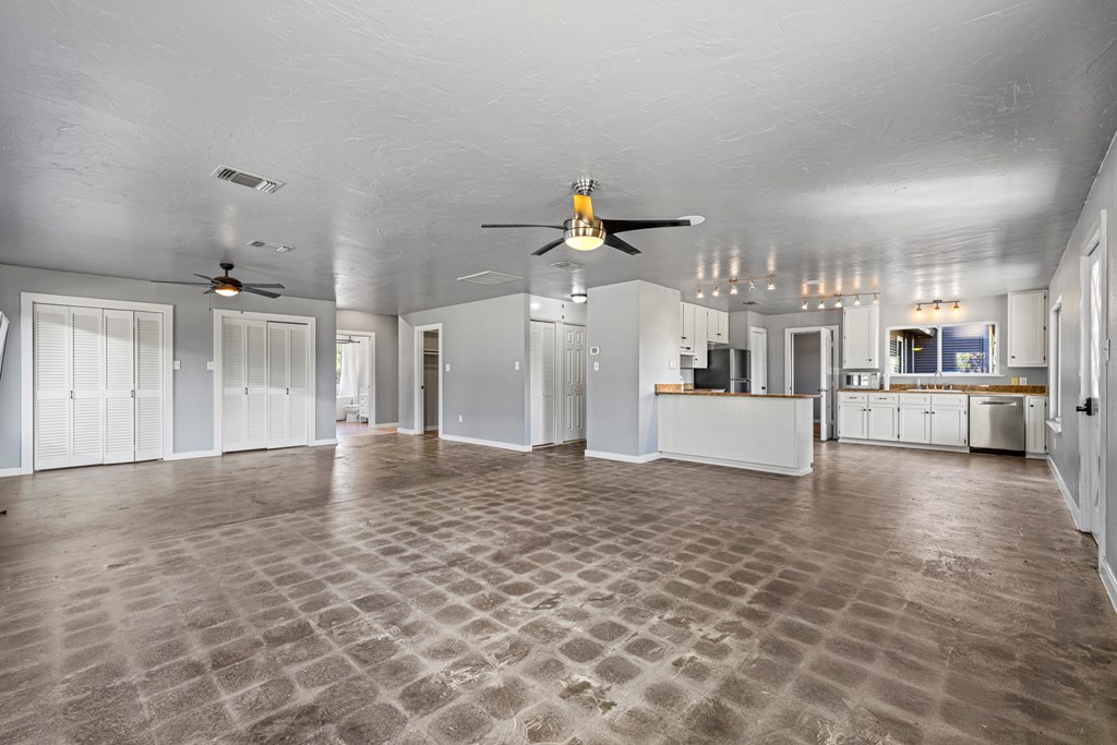 713 Ranch Road 1320 Hye, TX 78635 - Photo 11 of 26 a view of a kitchen with a sink and a kitchen floor