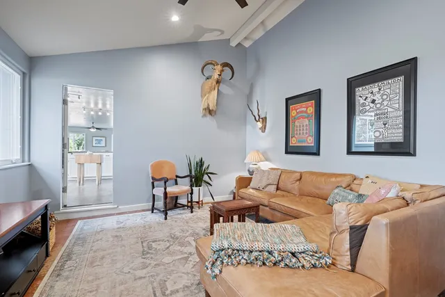 a living room with furniture and a window