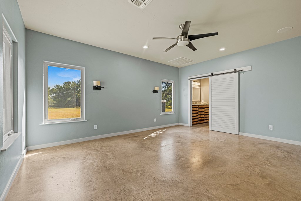 713 Ranch Road 1320 Hye, TX 78635 - Photo 20 of 26 a view of an empty room with a window