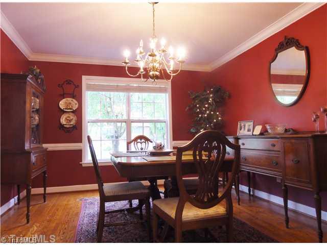 411 Walnut Grove Road Archdale, NC 27263 - Photo 5 of 16 Dining Room. Wonderful light and warm wood flooring brighten the formal dining area