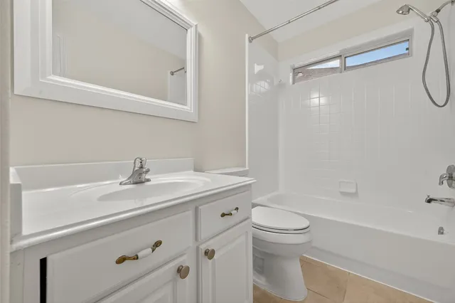 a bathroom with a sink a toilet and a bathtub
