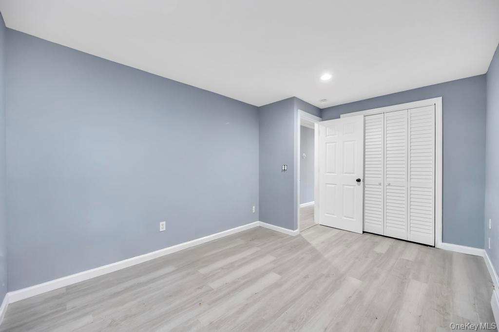 231 Elm Road West Mastic Beach, NY 11951 - Photo 26 of 34 a view of an empty room