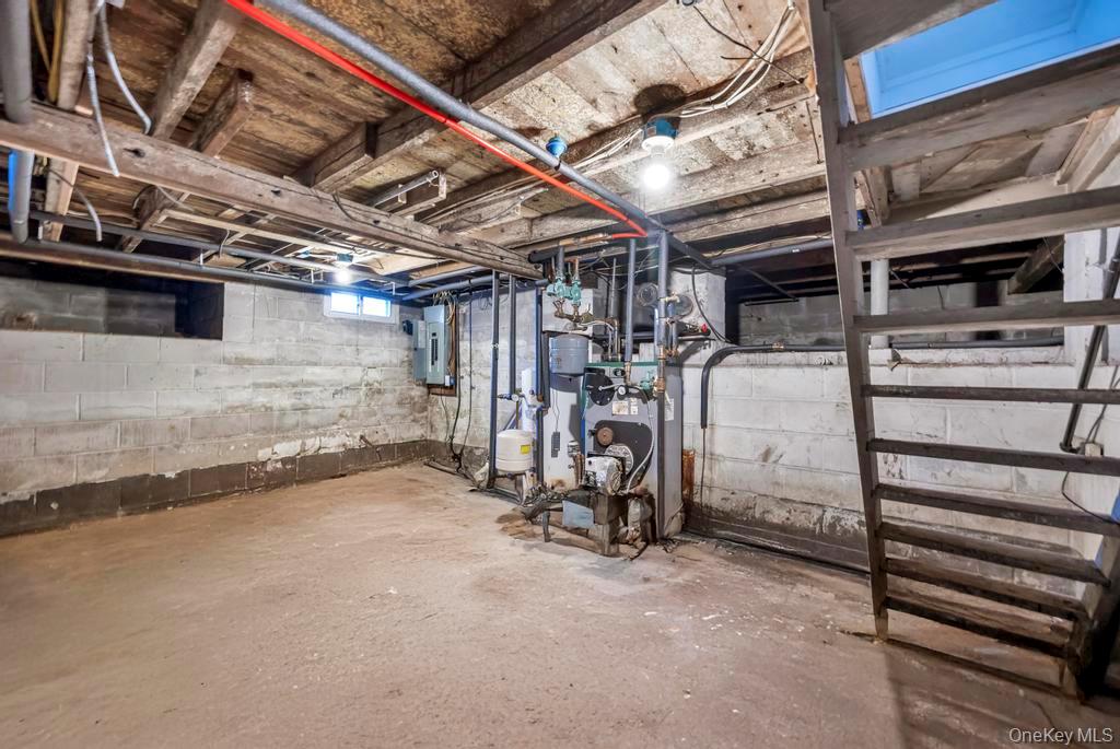 231 Elm Road West Mastic Beach, NY 11951 - Photo 32 of 34 a view of a room with gym equipment