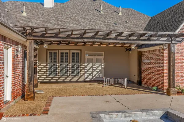 a front view of a house with a garage