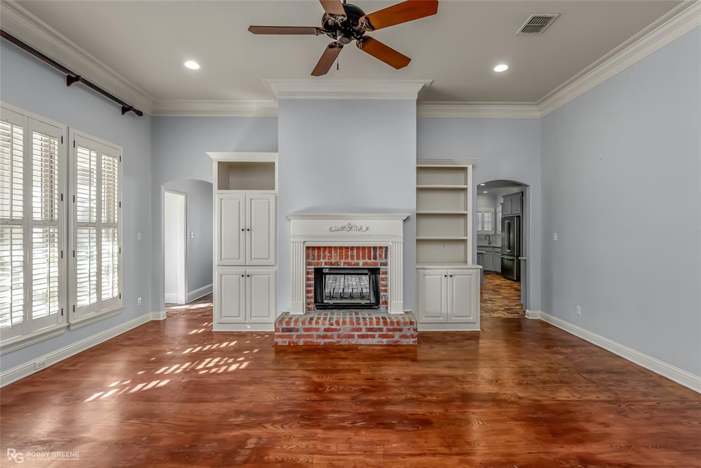 1012 Conti Circle Shreveport, LA 71106 - Photo 9 of 40 a view of a livingroom with a fireplace and window
