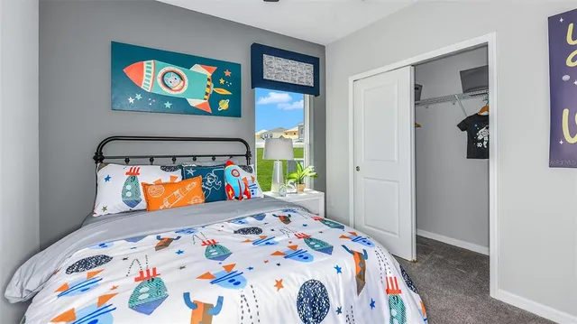 a view of a yard with flower plants