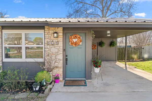 a view of a entryway door front of house