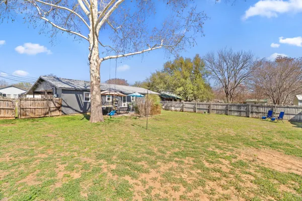 a view of a swimming pool with an outdoor space