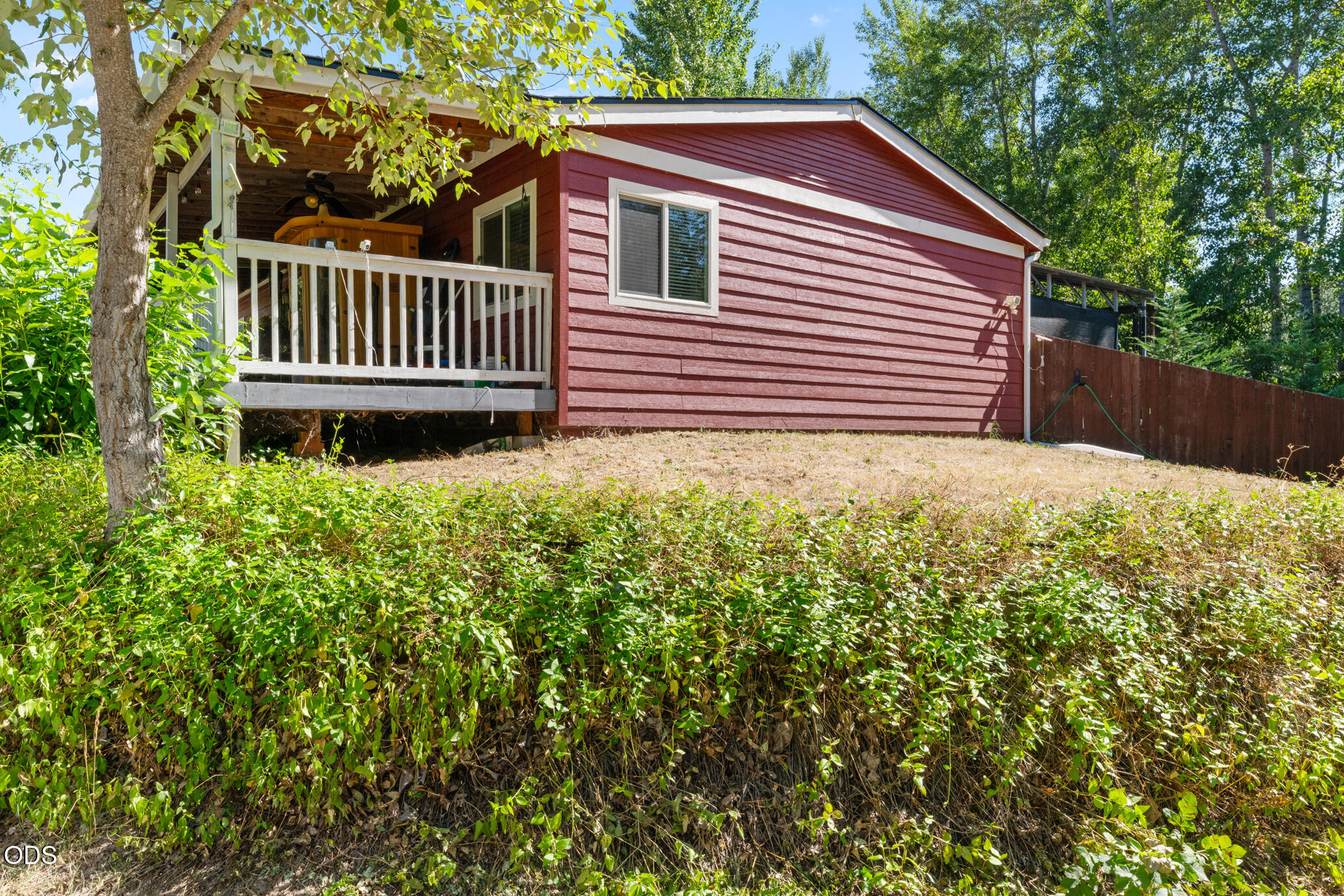 690 Foots Creek Road Gold Hill, OR 97525 - Photo 4 of 45 a view of a house with a yard