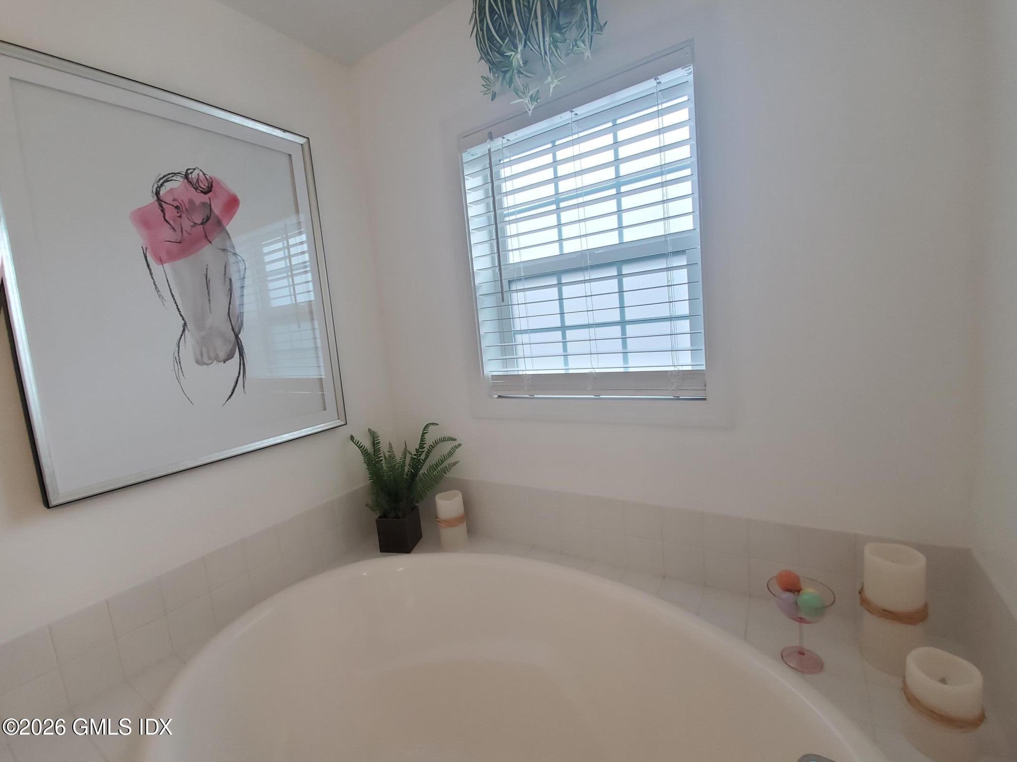 92 Valley Road, Unit B Cos Cob, CT 06807 - Photo 20 of 46 a bathroom with a tub and a shower