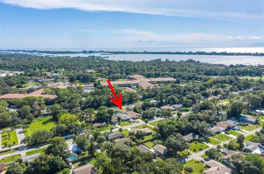 0 Benson Street Sarasota, FL 34231 - Photo 11 of 12 an aerial view of a houses with a swimming pool
