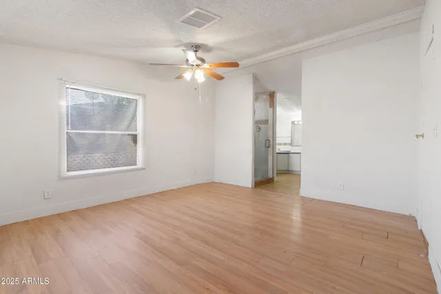 a view of yard with swimming pool