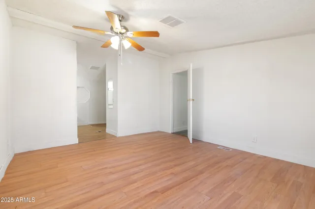 a outdoor space with lots of tables and chairs