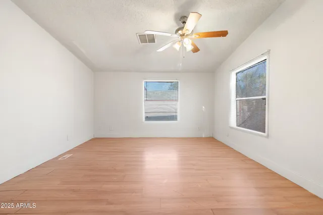 a view of a street with wooden stairs