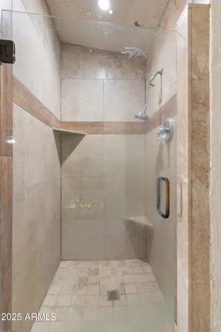 a view of a swimming pool with outdoor seating