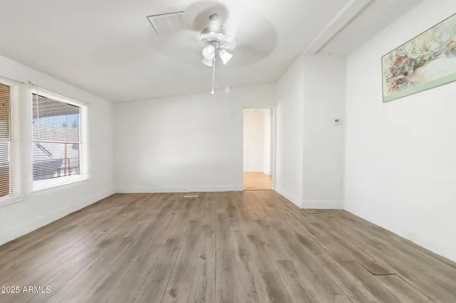a kitchen with a sink stove and refrigerator