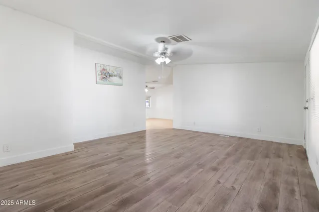 a kitchen with a sink stove and refrigerator