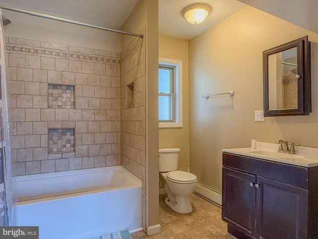 a bathroom with a bathtub