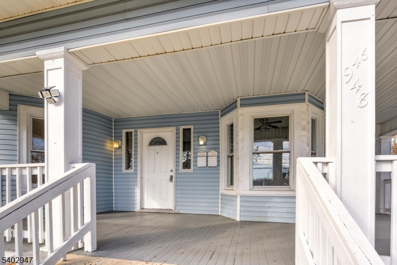 a view of a house with wooden floor and stairs