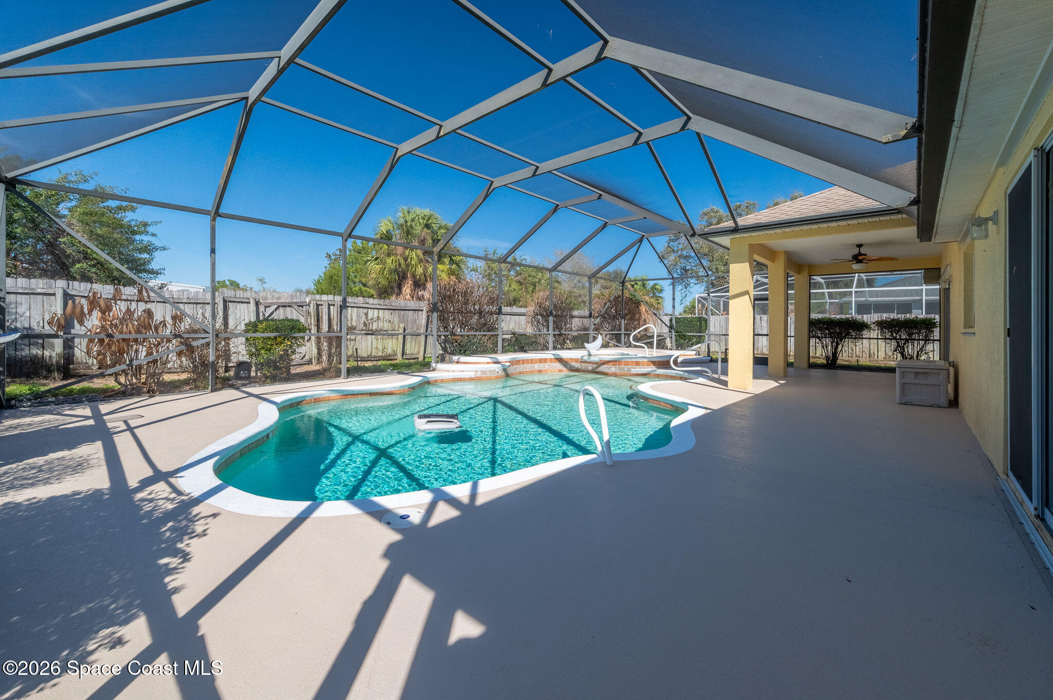 428 Wenthrop Circle Rockledge, FL 32955 - Photo 50 of 58 a view of a swimming pool with a patio