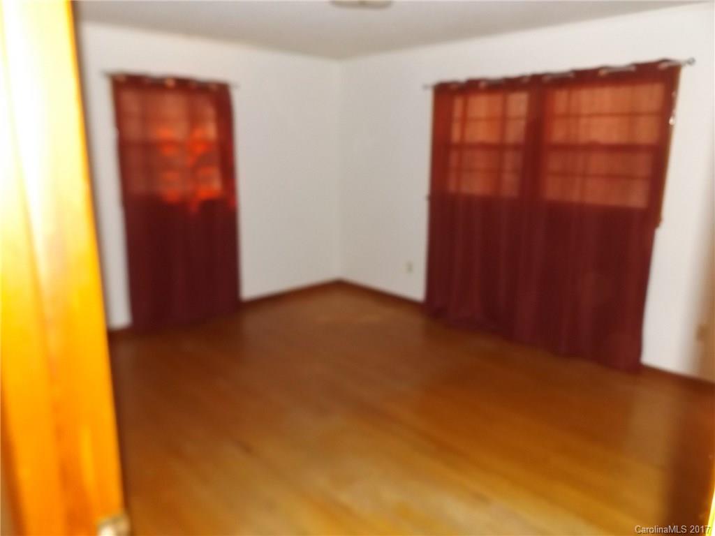 502 Wilson Cove Road Canton, NC 28716 - Photo 4 of 18 an empty room with windows