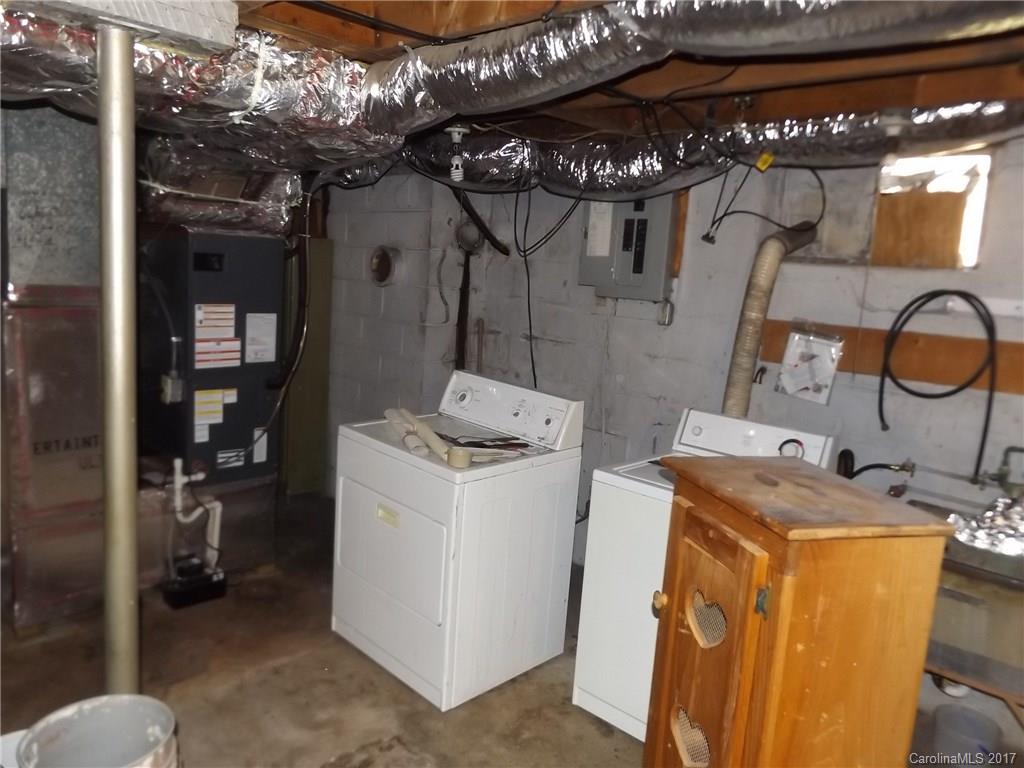 502 Wilson Cove Road Canton, NC 28716 - Photo 6 of 18 a utility room with dryer and washer