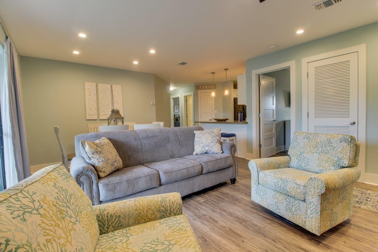 3799 East County Highway 30A, Unit F13 Santa Rosa Beach, FL 32459 - Photo 1 of 30 a living room with furniture and a large window