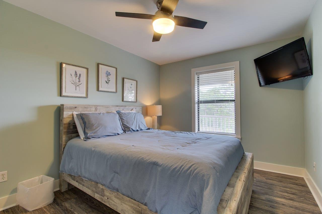 3799 East County Highway 30A, Unit F13 Santa Rosa Beach, FL 32459 - Photo 15 of 30 a bedroom with a bed and a flat tv screen on dresser