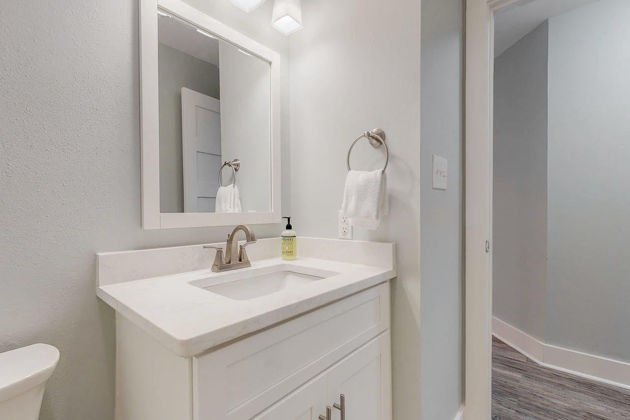3799 East County Highway 30A, Unit F13 Santa Rosa Beach, FL 32459 - Photo 17 of 30 a bathroom with a sink and a mirror