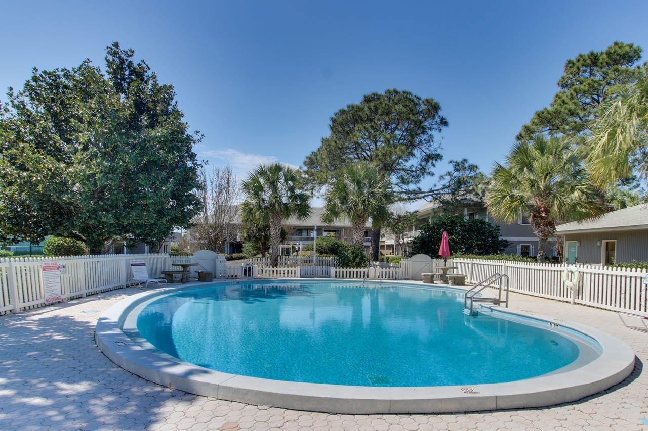 3799 East County Highway 30A, Unit F13 Santa Rosa Beach, FL 32459 - Photo 21 of 30 a view of a swimming pool with outdoor seating