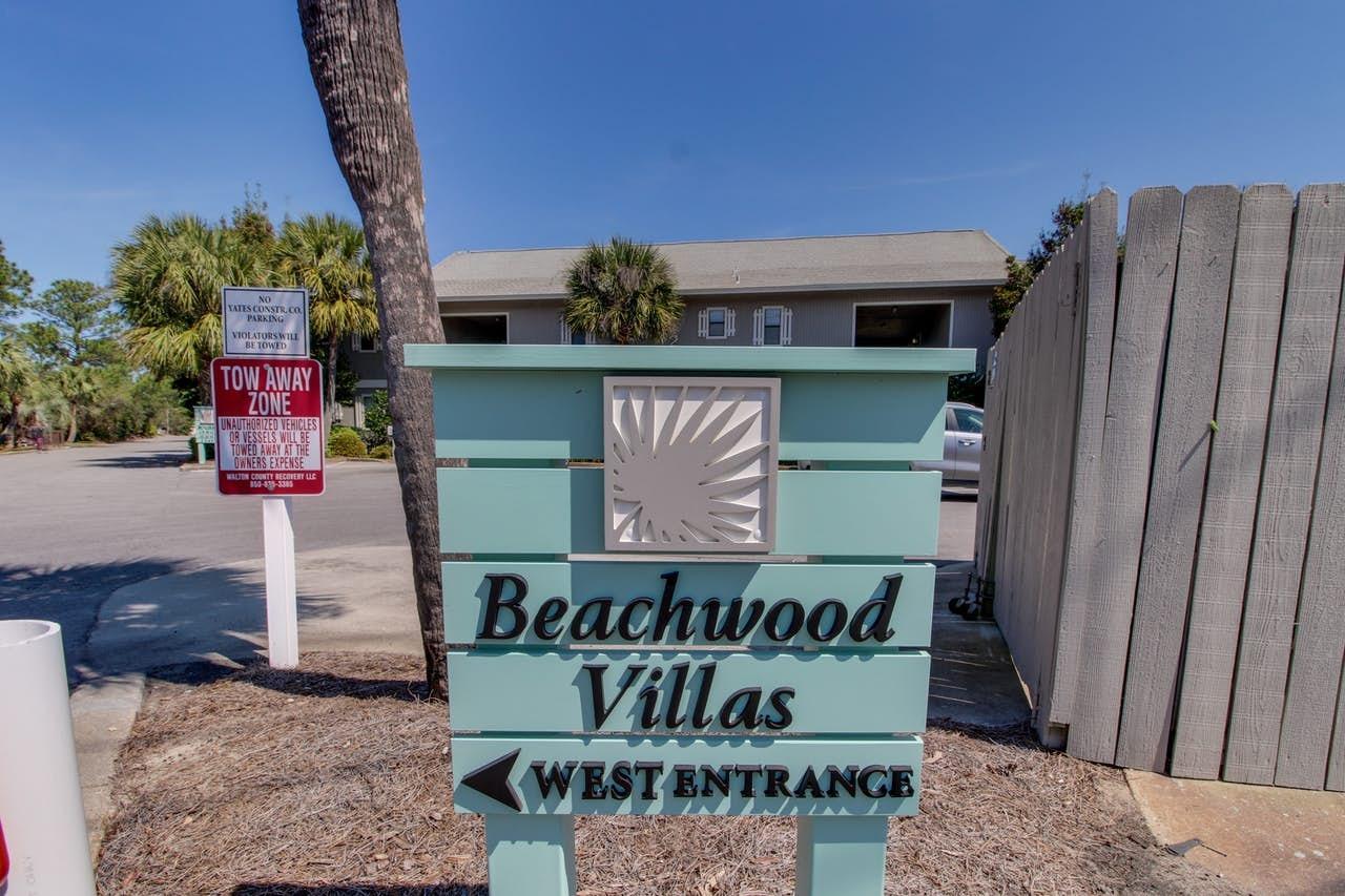 3799 East County Highway 30A, Unit F13 Santa Rosa Beach, FL 32459 - Photo 24 of 30 a sign on the side of a building