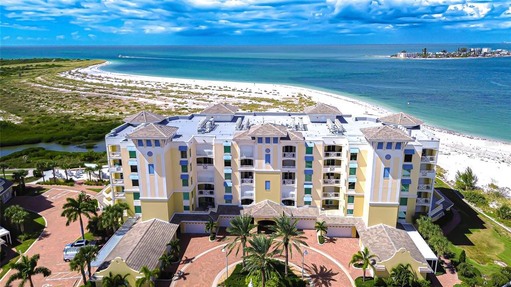 a view of a city with an ocean view