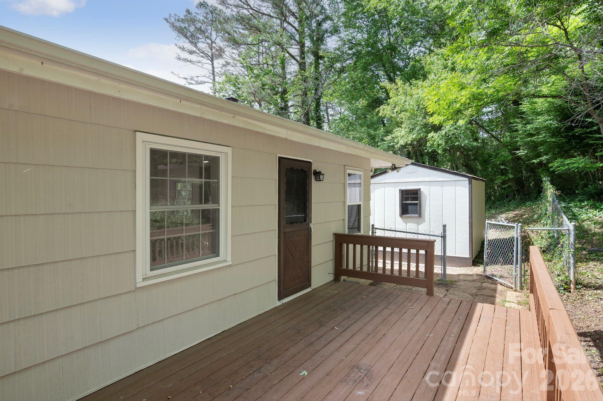 34 Wolfe Cove Road Asheville, NC 28804 - Photo 35 of 42 a view of a house with a deck