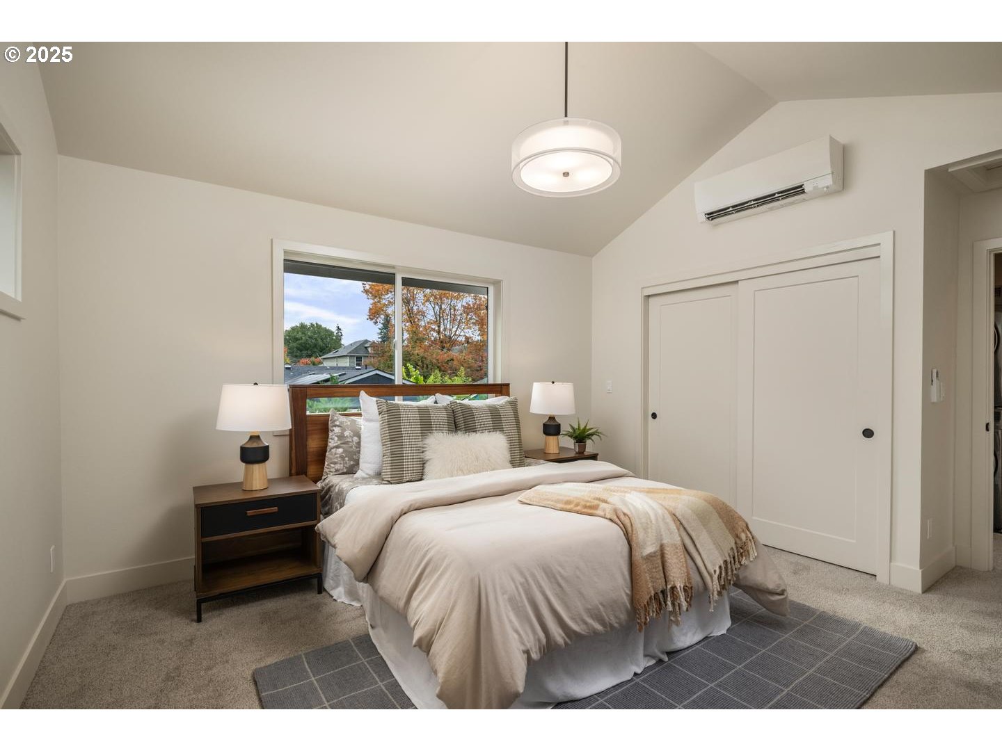 2624 North Kilpatrick Street Portland, OR 97217 - Photo 20 of 34 a bedroom with a bed and a window