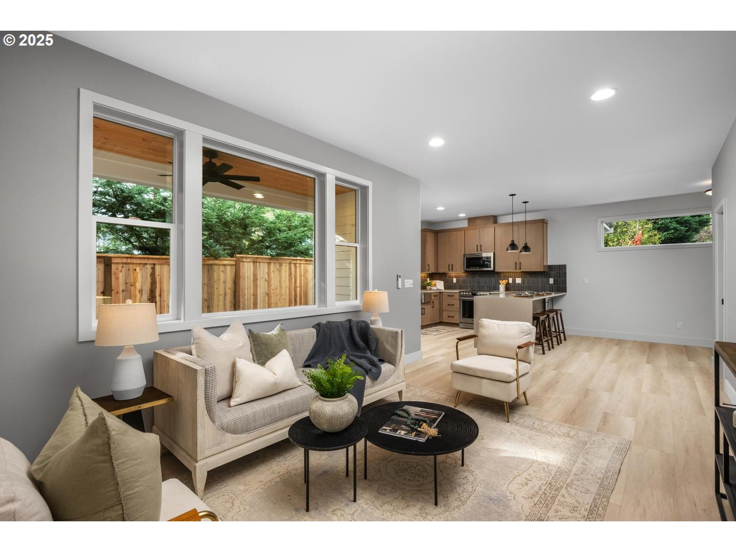 2624 North Kilpatrick Street Portland, OR 97217 - Photo 7 of 34 a living room with furniture and a large window