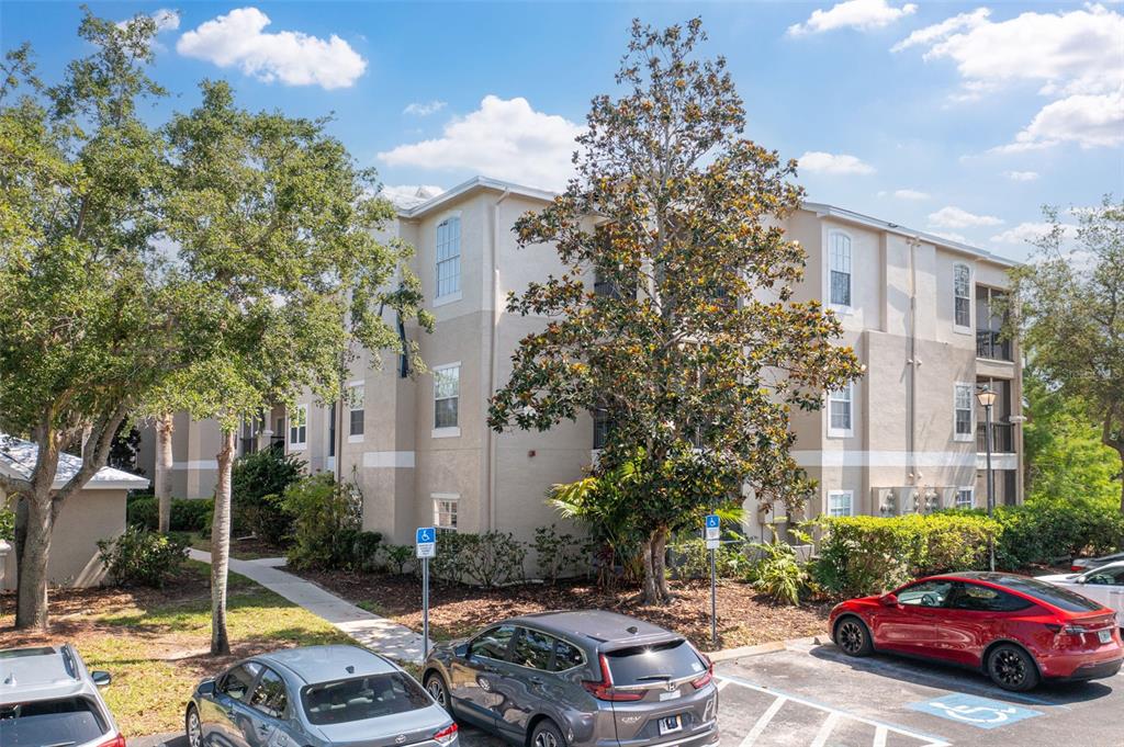 a car parked in front of a brick house