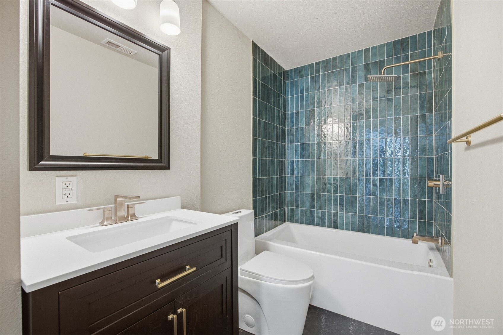 1205 Humboldt Street Bellingham, WA 98225 - Photo 21 of 40 a bathroom with a sink a toilet and shower